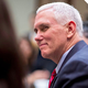 Here’s Mike Pence smiling yesterday at a panel for women in small business. Image via Getty.